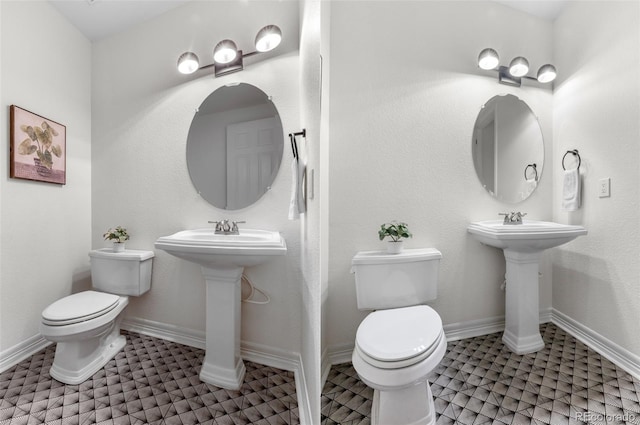 10546 Sundial Rim Rd, Highlands Ranch, CO 80126 - bathroom featuring toilet, tile patterned floors, and a sink