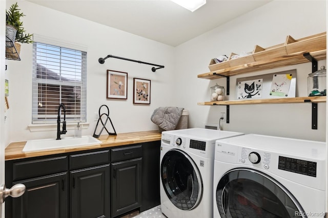 10546 Sundial Rim Rd, Highlands Ranch, CO 80126 - laundry area featuring washer and dryer and cabinet space