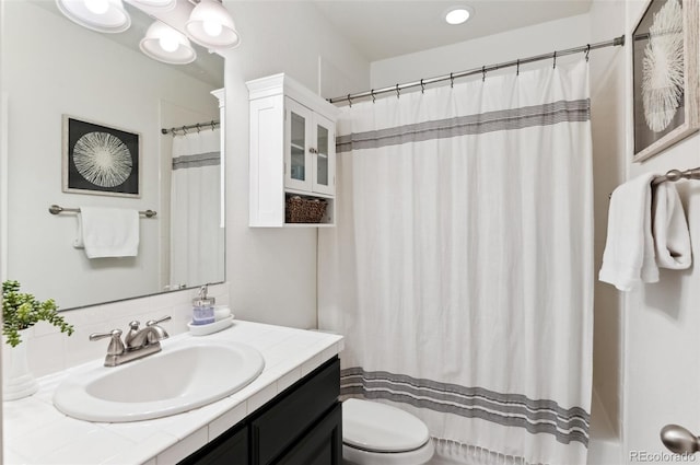 10546 Sundial Rim Rd, Highlands Ranch, CO 80126 - bathroom featuring vanity, toilet, and a shower with curtain