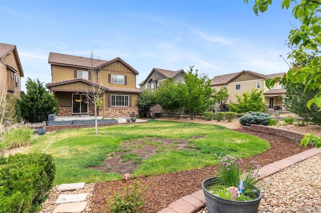10546 Sundial Rim Rd, Highlands Ranch, CO 80126 - view of green lawn featuring a patio area
