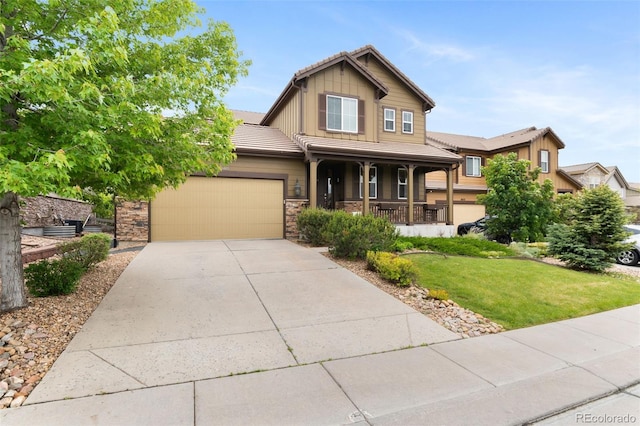 10546 Sundial Rim Rd, Highlands Ranch, CO 80126 - view of front of house featuring a porch, an attached garage, board and batten siding, a front yard, and a tile roof
