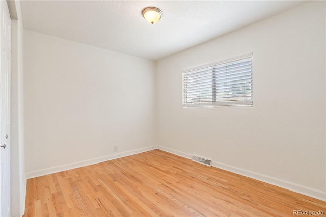 4972 W Custer Pl, Denver, CO 80219 - unfurnished room featuring light wood-style flooring and baseboards