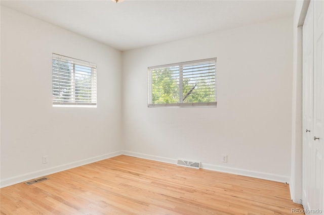 4972 W Custer Pl, Denver, CO 80219 - empty room featuring light wood-style flooring and baseboards