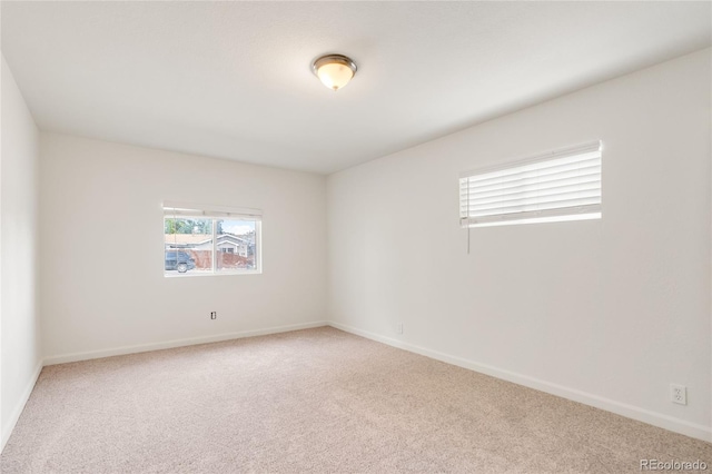 4972 W Custer Pl, Denver, CO 80219 - carpeted spare room featuring baseboards