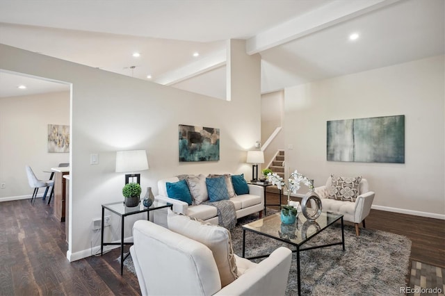 living room featuring vaulted ceiling with beams and dark hardwood / wood-style floors