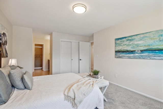 bedroom featuring carpet floors and a closet