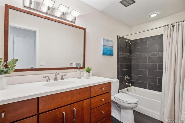 full bathroom featuring vanity, toilet, and shower / tub combo with curtain