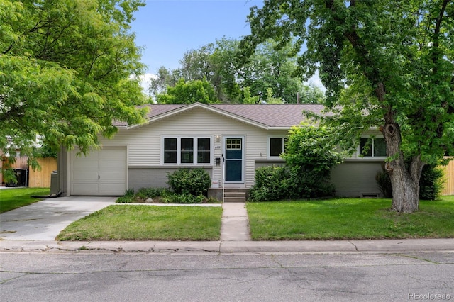 6402 Iris Ct, Arvada, CO 80004 - ranch-style house featuring a garage, concrete driveway, a front yard, a shingled roof, and entry steps