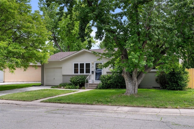 6402 Iris Ct, Arvada, CO 80004 - single story home with a garage, driveway, and a front yard