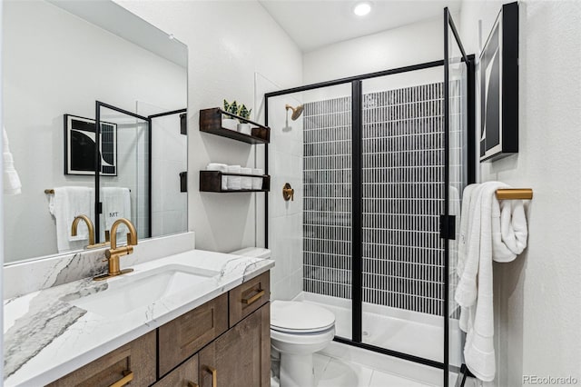 17146 W 92nd Loop, Arvada, CO 80007 - bathroom with a shower stall, toilet, and vanity