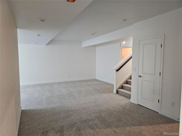 17146 W 92nd Loop, Arvada, CO 80007 - finished below grade area featuring carpet floors, stairs, and baseboards