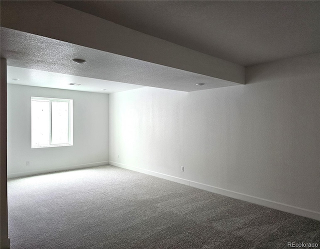 17146 W 92nd Loop, Arvada, CO 80007 - unfurnished room with carpet flooring, baseboards, and a textured ceiling