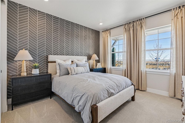 17146 W 92nd Loop, Arvada, CO 80007 - bedroom featuring wallpapered walls, an accent wall, baseboards, carpet floors, and recessed lighting