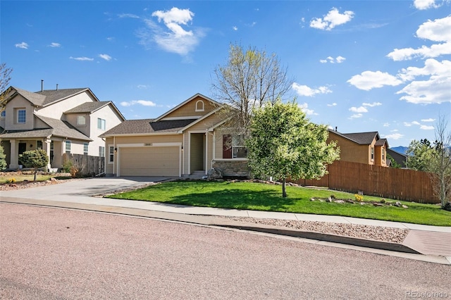 view of front of house featuring an attached garage and driveway