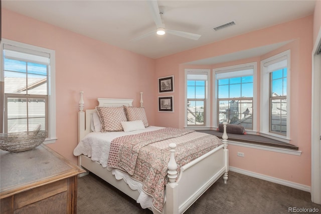 carpeted bedroom featuring ceiling fan