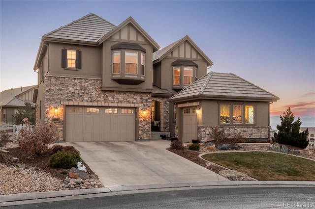 view of front of property with a garage