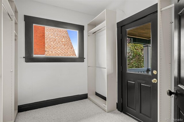 interior space with baseboards