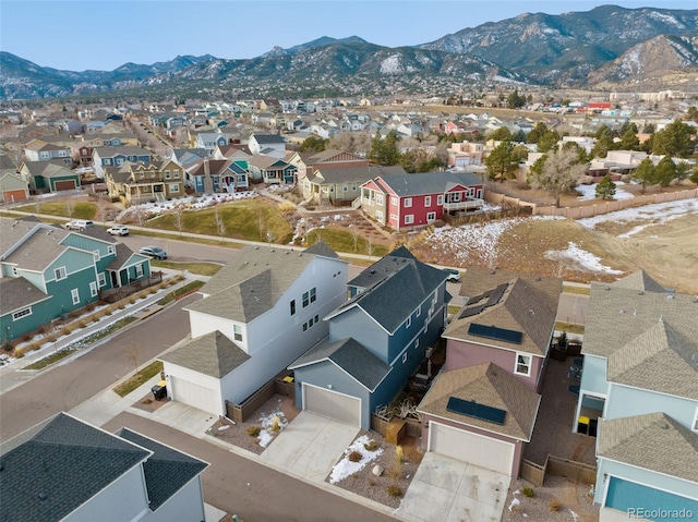 birds eye view of property featuring a mountain view