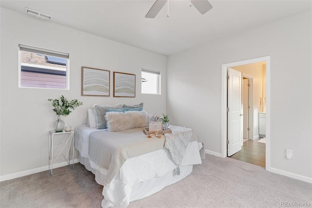 bedroom with ceiling fan and carpet