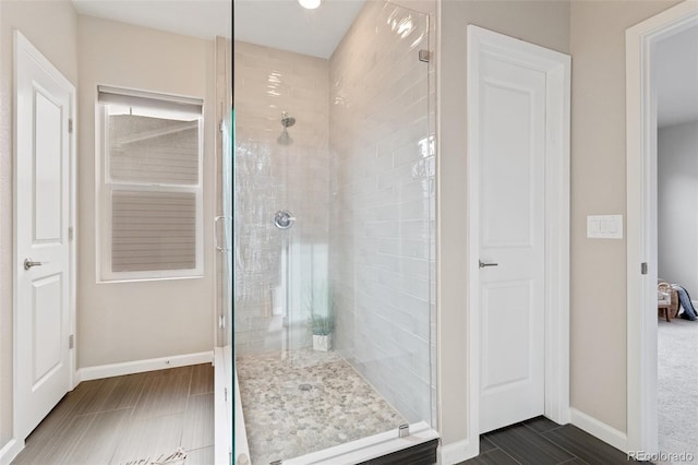 bathroom featuring an enclosed shower