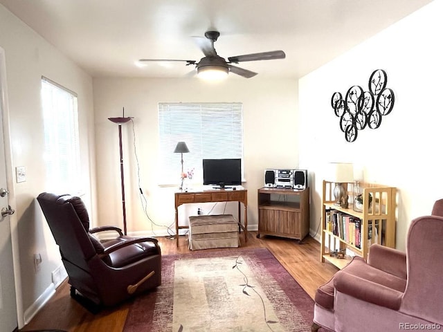 2285 S Knox Ct, Denver, CO 80219 - home office featuring a ceiling fan and wood finished floors