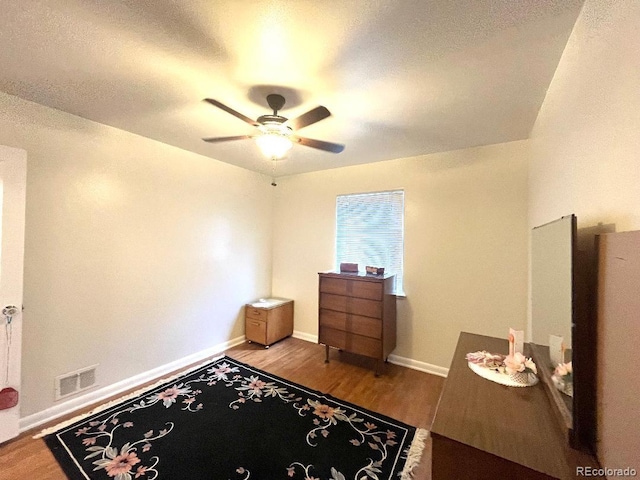 2285 S Knox Ct, Denver, CO 80219 - bedroom featuring wood finished floors and a ceiling fan