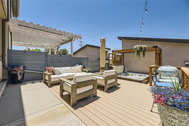 wooden deck featuring a jacuzzi, an outdoor living space, and a pergola