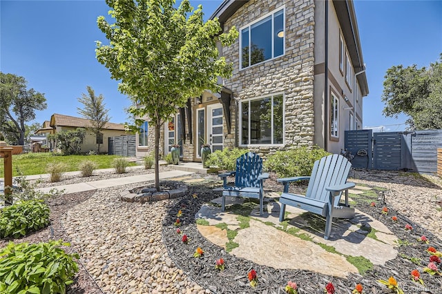 rear view of house with a patio