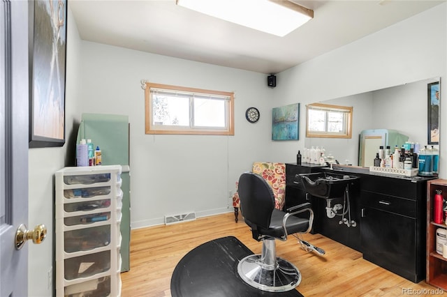5567 E Asbury Ave, Denver, CO 80222 - office area featuring wood finished floors and baseboards