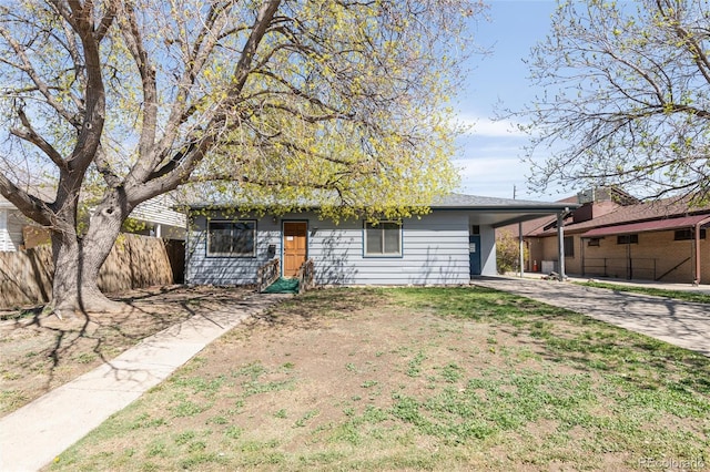 5567 E Asbury Ave, Denver, CO 80222 - view of front of property with concrete driveway and an attached carport