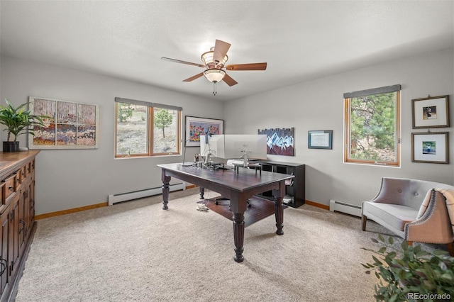 home office featuring ceiling fan, baseboard heating, and light carpet