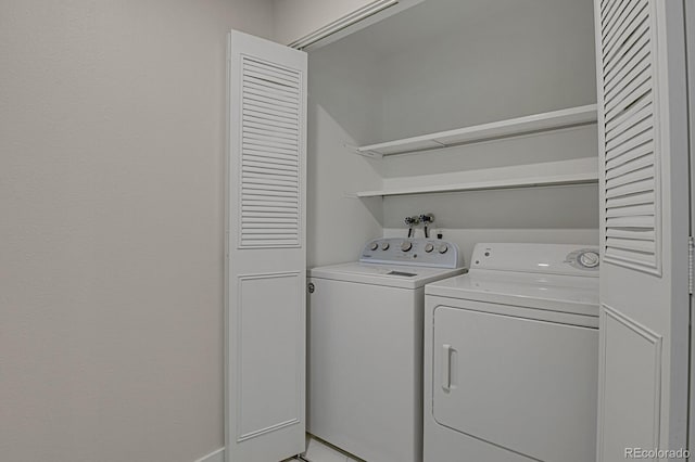 washroom featuring separate washer and dryer