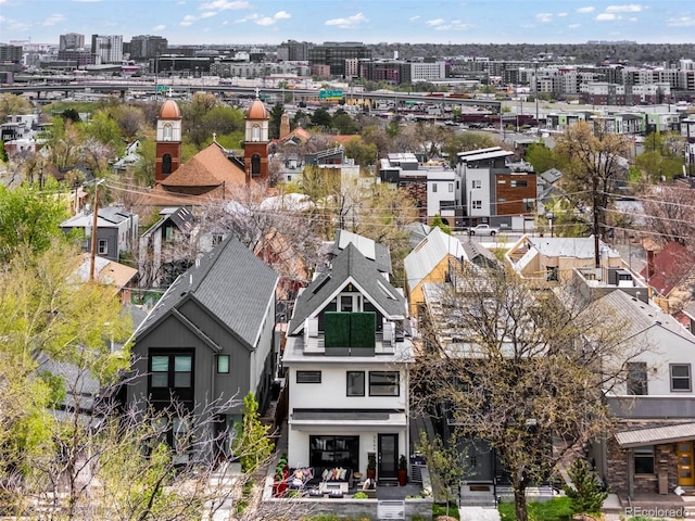 drone / aerial view featuring a city view