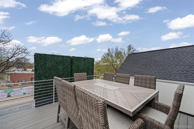 deck with outdoor dining space
