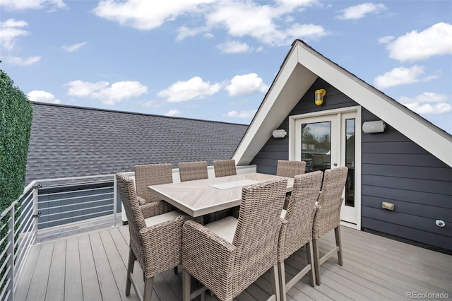 wooden terrace featuring outdoor dining space