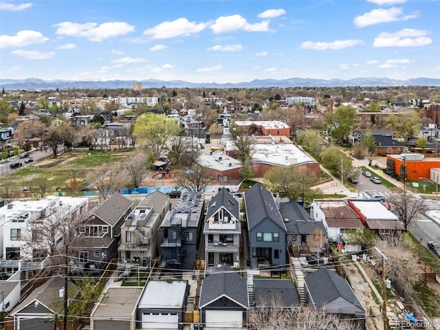 bird's eye view with a residential view and a mountain view