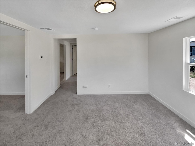 438 S 7th Ave, Brighton, CO 80601 - carpeted spare room featuring baseboards