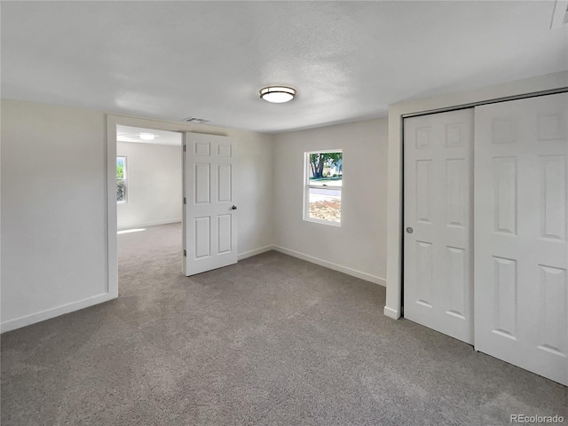 438 S 7th Ave, Brighton, CO 80601 - unfurnished bedroom featuring carpet and a closet