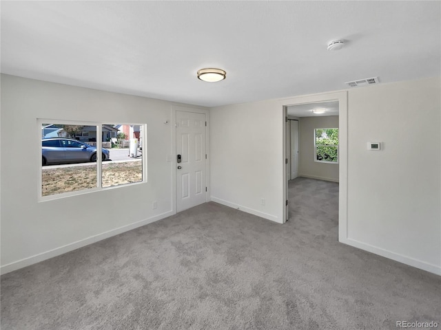 438 S 7th Ave, Brighton, CO 80601 - spare room with carpet flooring and a smoke detector