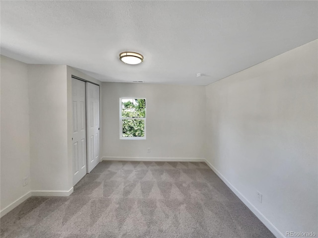 438 S 7th Ave, Brighton, CO 80601 - unfurnished bedroom featuring carpet flooring and a closet