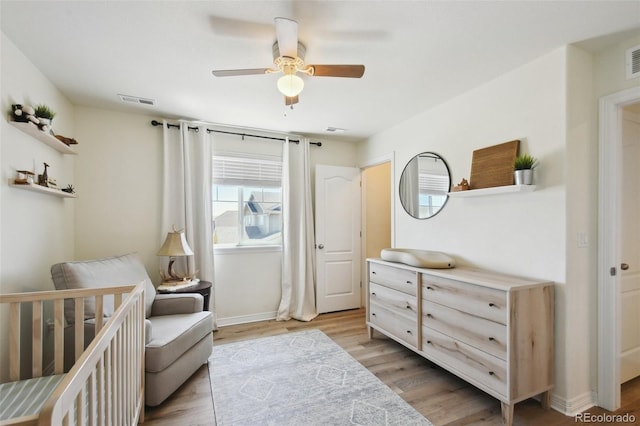 16188 Elizabeth St, Thornton, CO 80602 - bedroom featuring light wood-type flooring and a ceiling fan