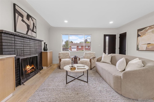 4580 Garland St, Wheat Ridge, CO 80033 - living room with light wood-style flooring, a fireplace, and recessed lighting
