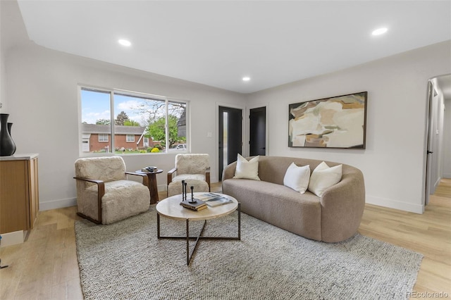 4580 Garland St, Wheat Ridge, CO 80033 - living area featuring light wood-style floors, baseboards, and recessed lighting