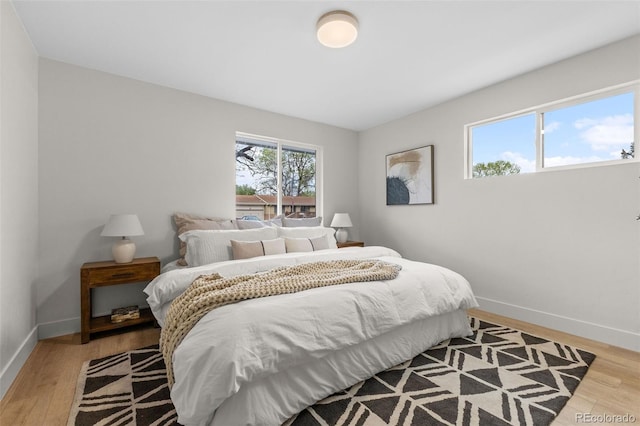 4580 Garland St, Wheat Ridge, CO 80033 - bedroom with baseboards and light wood-style flooring