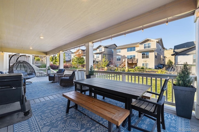 view of patio / terrace featuring a residential view and outdoor dining space