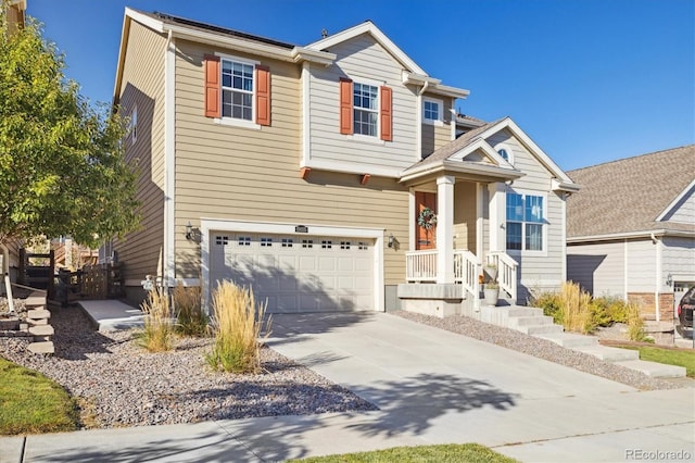 view of front facade featuring an attached garage and driveway