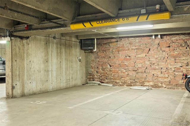 1800 Lawrence St Unit 303, Denver, CO 80202 - below grade area featuring brick wall