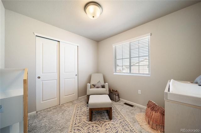 sitting room with light carpet