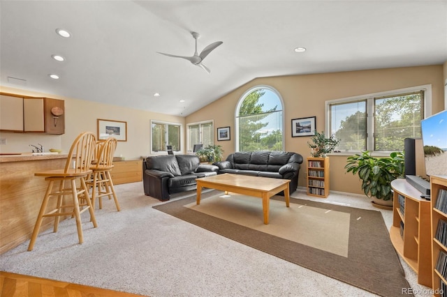 3176 S Alton Ct, Denver, CO 80231 - living area with a ceiling fan, lofted ceiling, recessed lighting, and light carpet