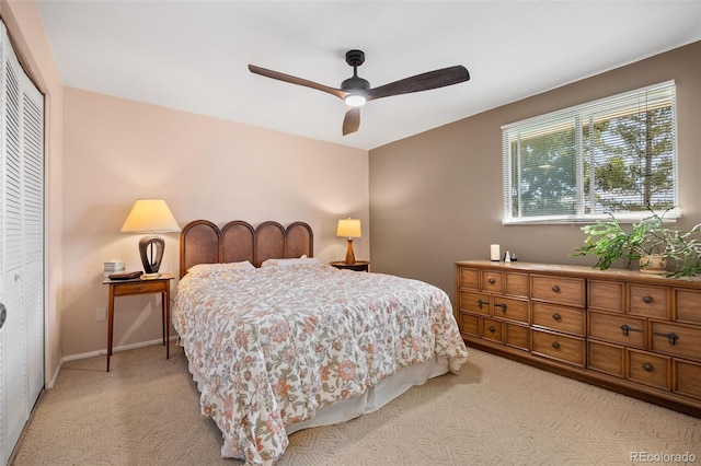 3176 S Alton Ct, Denver, CO 80231 - bedroom with light carpet, a closet, and a ceiling fan